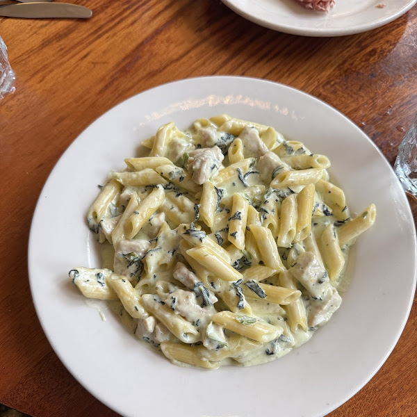 Caffe Luna signature dishes Rigatoni con Salsiccia e FunghiSalmone con CapperiRavioli di Zucca